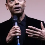 Jeff Mills speaking at a microphone